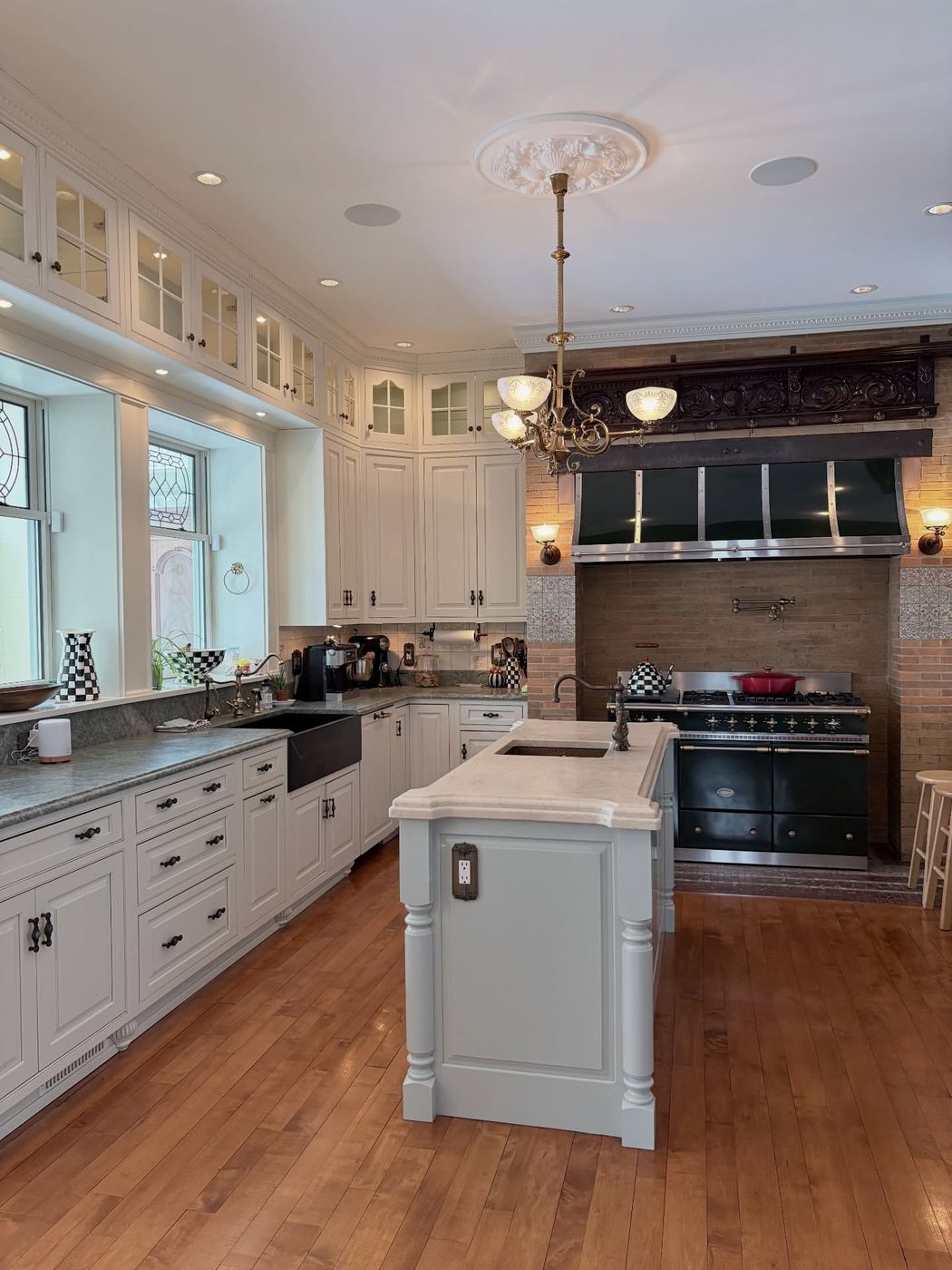 Detailed kitchen with a statement range, left spotless