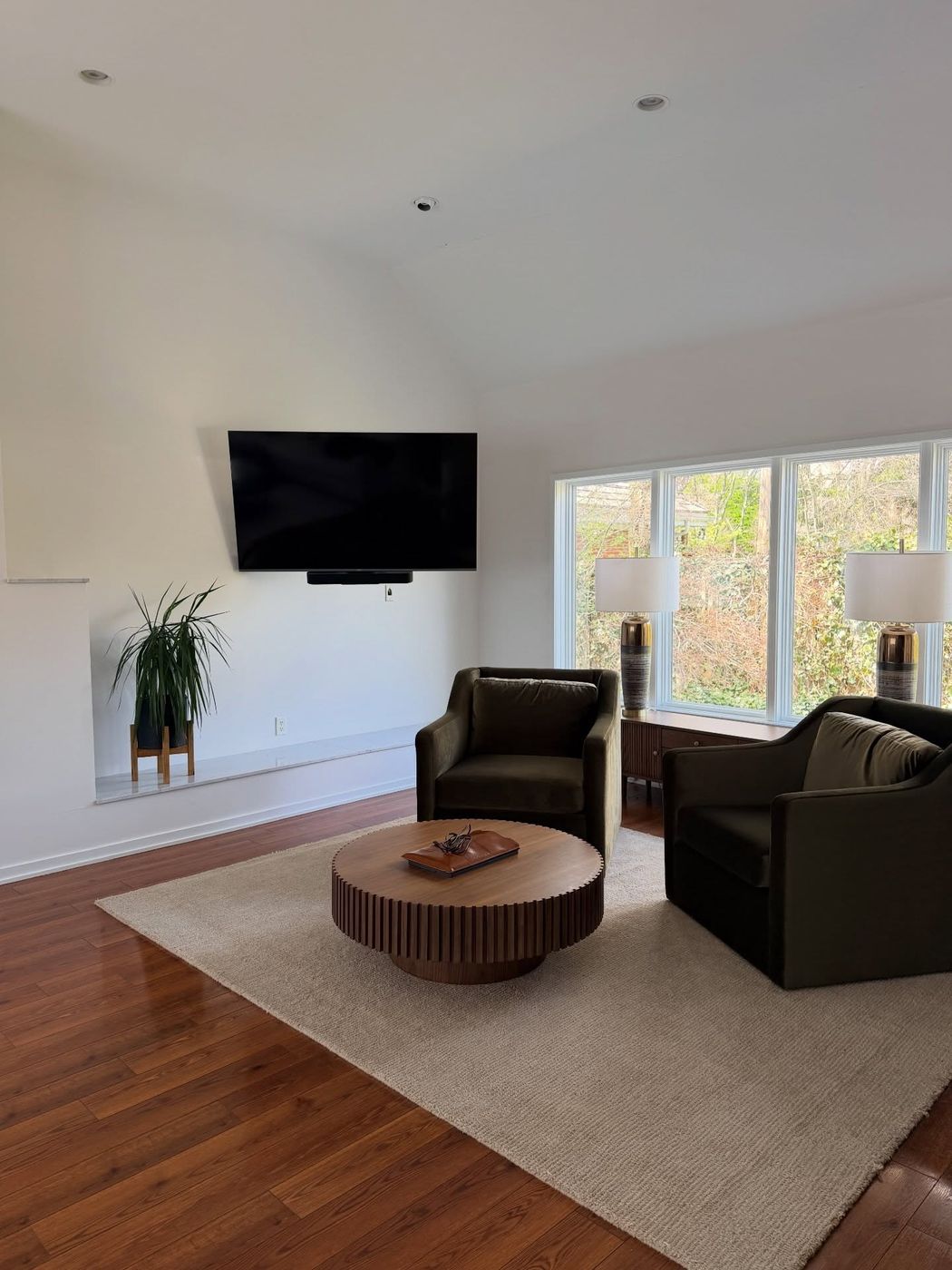 Sunlit modern living room, freshly cleaned