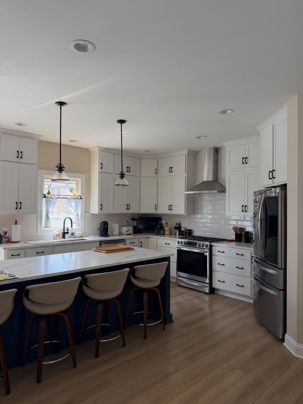 Bright white kitchen with island, spotless