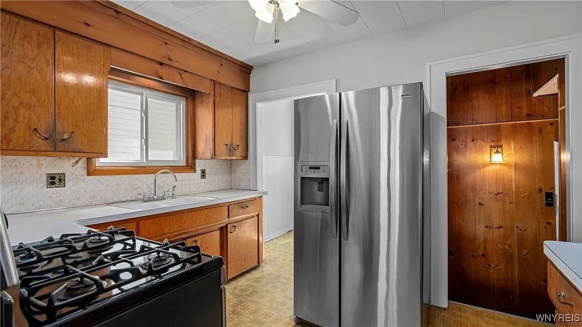 Detailed kitchen clean with stainless appliances